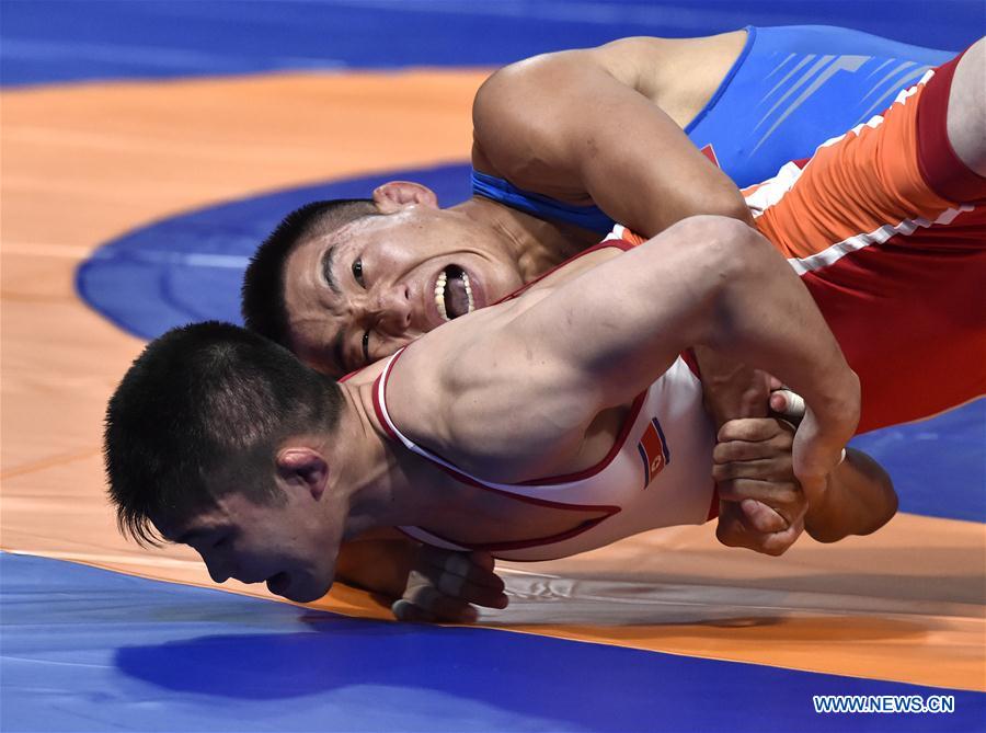 (SP)INDONESIA-JAKARTA-ASIAN GAMES-WRESTLING-MEN'S FREESTYLE 57 KG