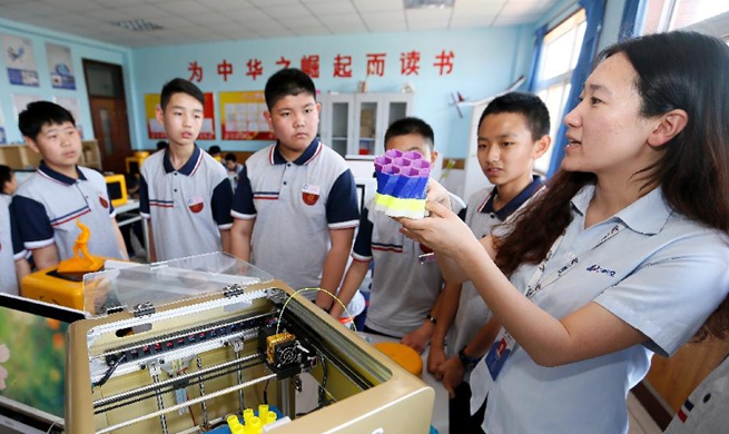 Students experience 3D printing at course in Qingdao, E China's Shandong