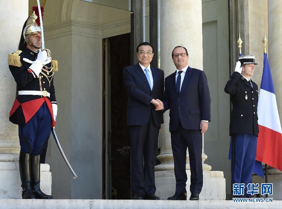 当地时间6月30日下午，国务院总理李克强在巴黎爱丽舍宫会见法国总统奥朗德。 新华社记者李学仁摄